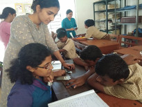 Volunteers from Chetana interacting with boys from St Louis institute for the Deaf and Blind.